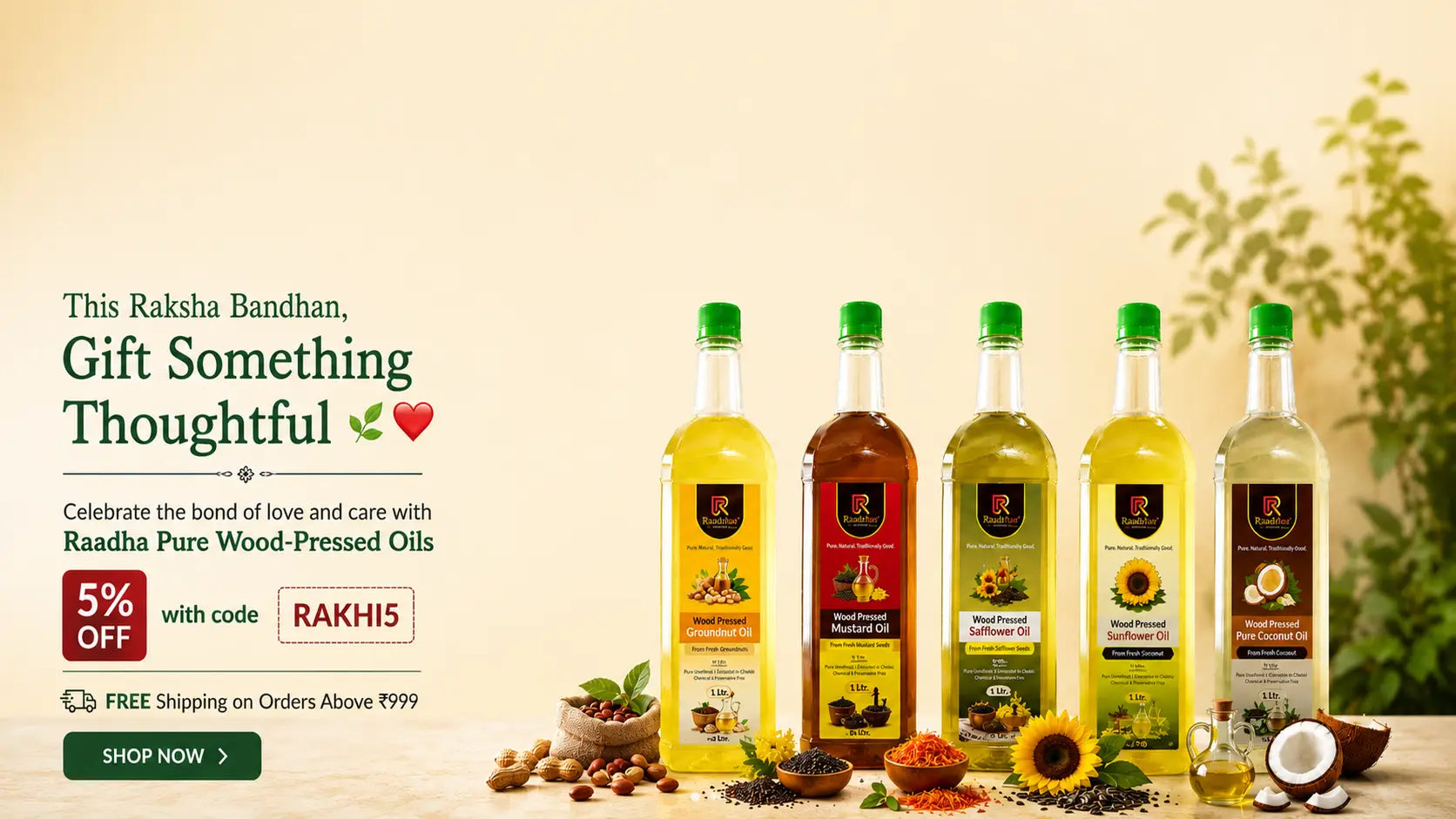Five bottles of Raadha Pure Wood-Pressed Oils in various flavors and colors, displayed on a table with ingredients like sunflower, Groundnut, Mustard, Safflower, and Coconut with the Rakhi discount code.